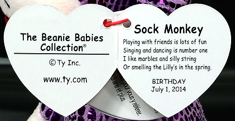 Sock Monkey (purple sparkle) - swing tag inside